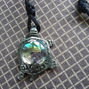 Turtle pendant made from pewter & glass on satin cord.